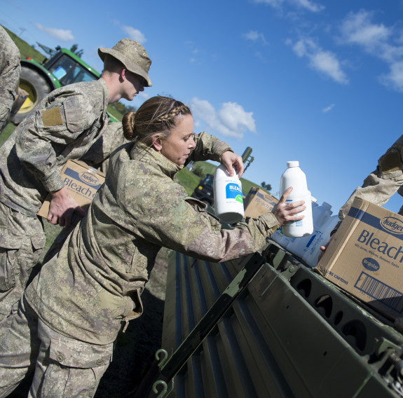 Personnel unload aid supplies from a truck in Kaikoura following a magnitude 7.5 Earthquake.