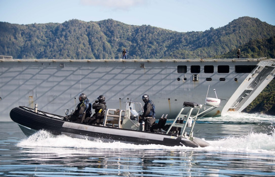 A Rigid Hulled Inflatable Boat conducts a survey of the Marlborough Sounds alongside HMNZS Canterbury as part of Exercise Southern Katipo.