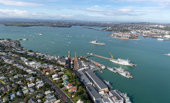 An aerial view of Devonport Naval Base on a nice day with a few clouds