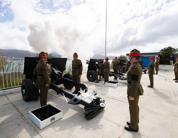 A gun line from 16 Field Regiment fire 105mm light howitzer guns at Point Jerningham