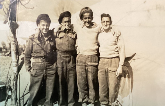 Sepia photo of four young people.